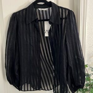 Black buttoned blouse